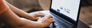 typing on a laptop