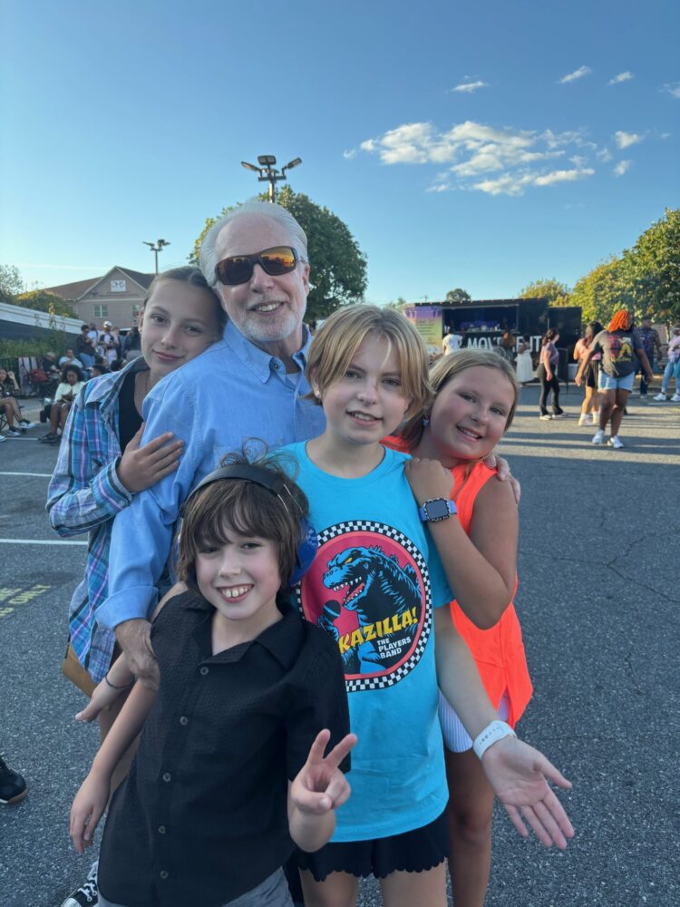 Dr. Levine poses with his family